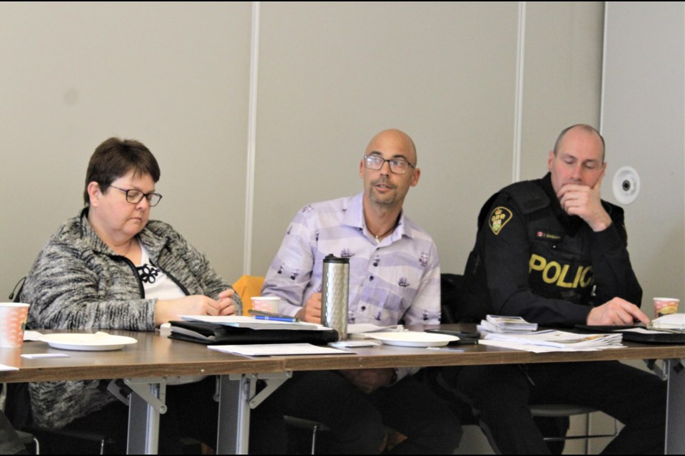 The Simcoe County Alliance to End Homelessness and Lakehead University hosted a housing and landlord town hall Wednesday at the Orillia Public Library. Among those taking part in the discussion were, from left, Kelly Smith, the City of Orillia's chief building official, Tom Fortier, program supervisor with the County of Simcoe's social housing department, and Orillia OPP Const. Ted Dongelmans. Nathan Taylor/OrilliaMatters
