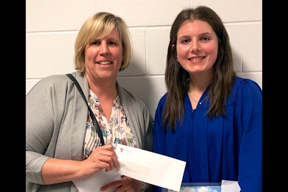 Elora Cronk accepted the Skid Watson YMCA Scholarship last June, presented by Dale Rowe, General Manager of Philanthropy, YMCA of Simcoe/Muskoka