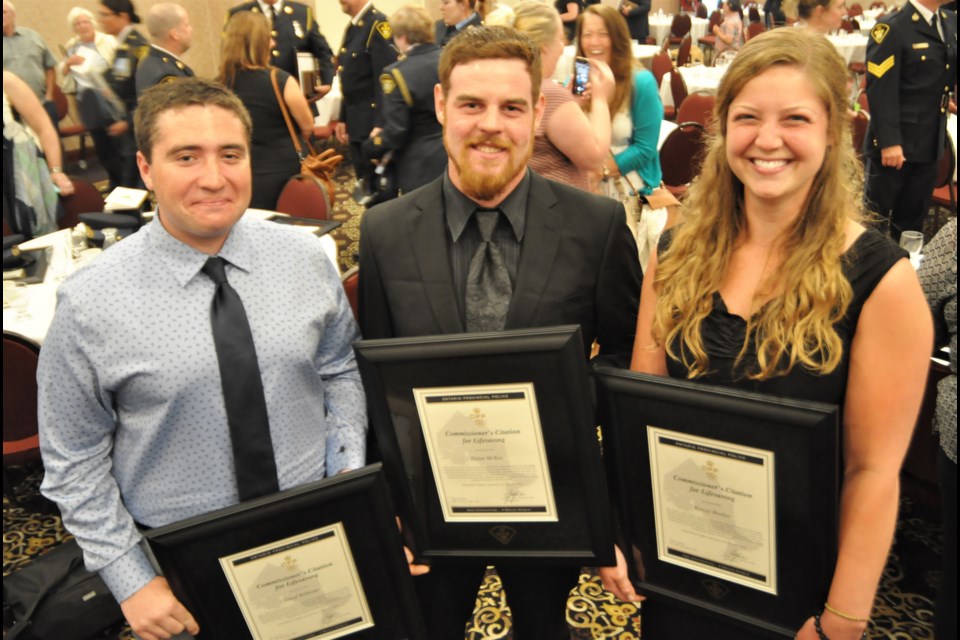 Chad Williams, Dylan McKee and Kenzie Brailey were recognized for their quick actions after a plane crashed into an Orillia-area lake last summer. Andrew Philips for OrilliaMatters
