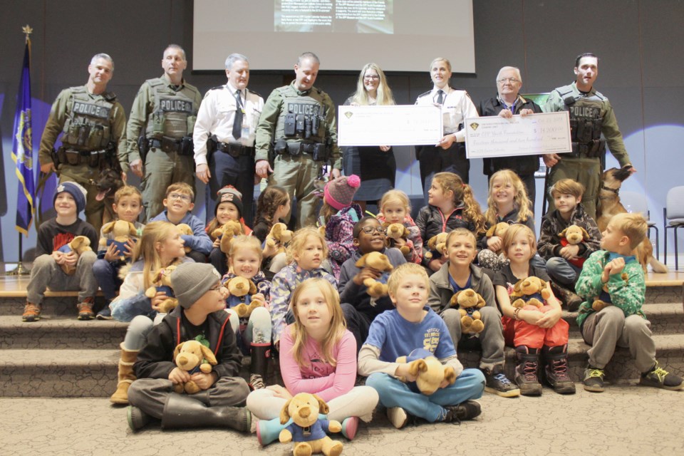 Students from Monsignor Lee Catholic School were on hand for the unveiling of the OPP Canine Calendar on Tuesday, Oct. 23, 2018, at OPP General Headquarters in Orillia. Nathan Taylor/OrilliaMatters