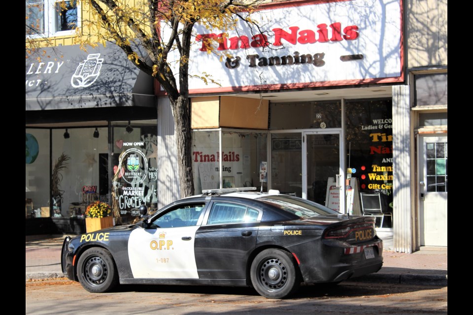 A police cruiser is shown Wednesday in front of Tina Nails and Tanning in downtown Orillia. Nathan Taylor/OrilliaMatters