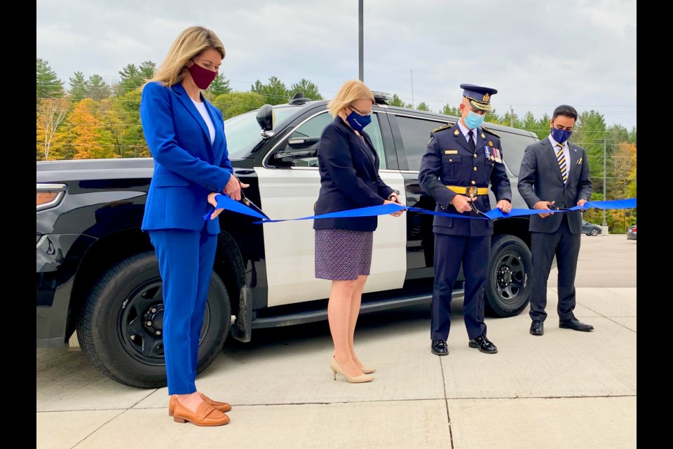 Cutting the ribbon Thursday at the new Orillia OPP detachment were, from left, Simcoe North MPP Jill Dunlop, Solicitor General Sylvia Jones, OPP Commissioner Thomas Carrique and Amarjot Sandhu, parliamentary assistant to the minister of infrastructure.