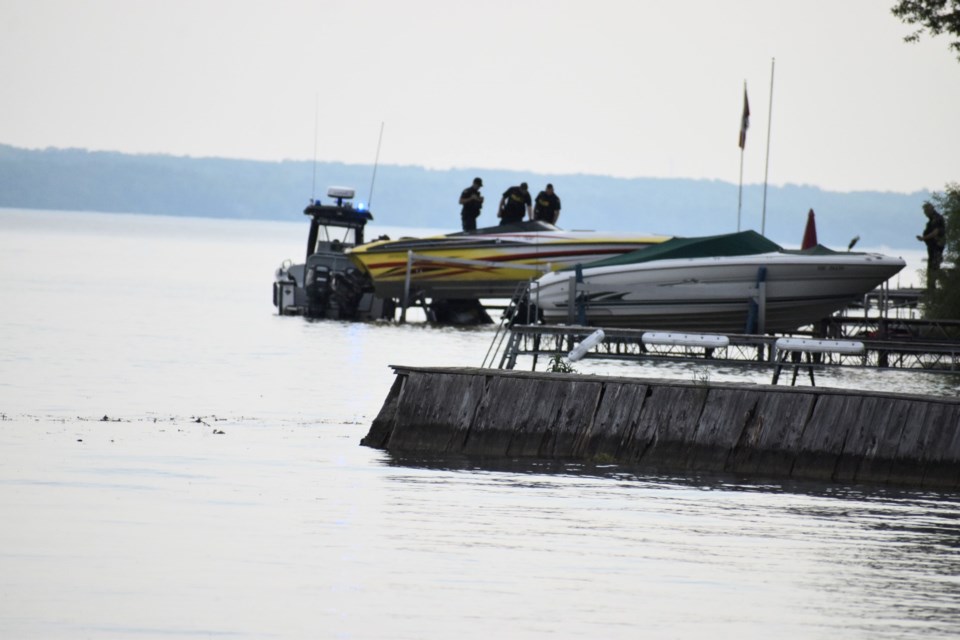 One man was seriously injured and two others are in police custody after a personal watercraft collided with a boat docked at a Lakeshore Road West residence in Oro-Medonte Township.