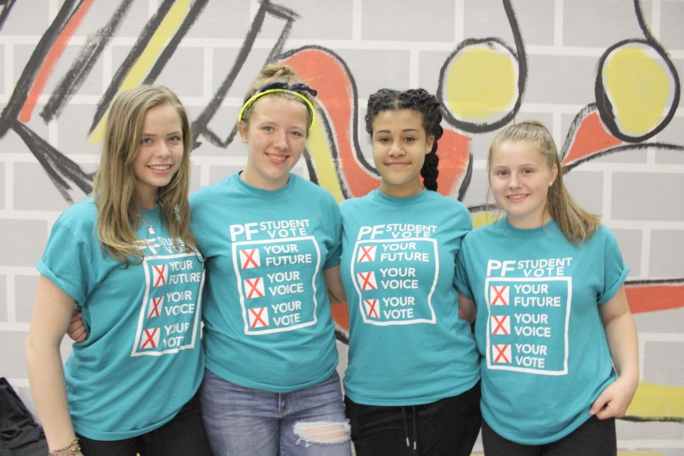 Rocking the student vote are, from left, Beth Wenzel, Abby Whalen, Jada Price and Kaitlyn Roberts. The students were on hand for Monday's Simcoe North candidates forum at Patrick Fogarty Catholic Secondary School. Nathan Taylor/OrilliaMatters