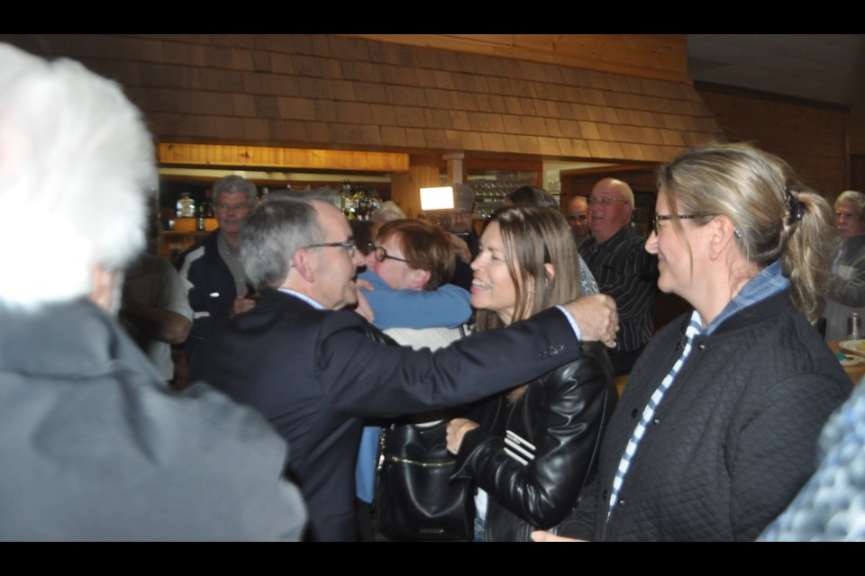 Bruce Stanton is congratulated after winning re-election in Monday night's federal election. It will be the fifth straight term for the Conservative MP. Andrew Philips/OrilliaMatters