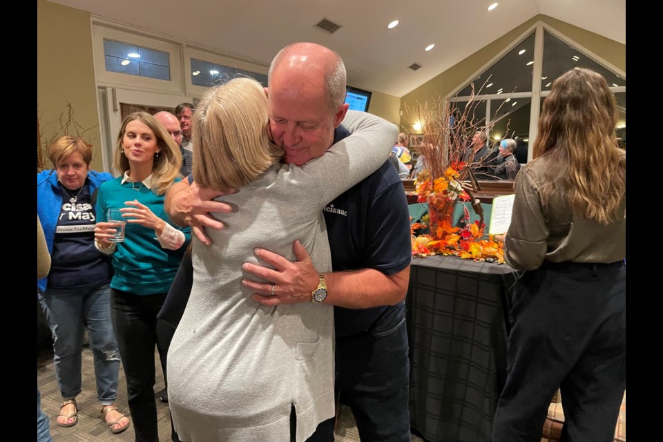 Don McIsaac hugs a supporter at Couchiching Golf and Country Club after becoming Orillia's new mayor. 