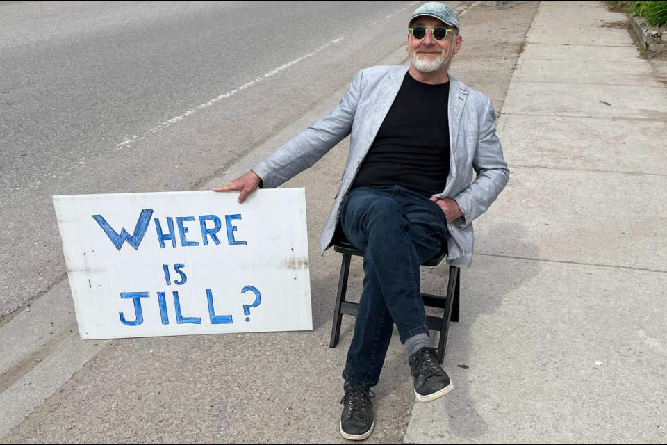 John Menear set up a lawn chair and spent several hours in front of Simcoe North MPP Jill Dunlop's Coldwater Road office Friday, protesting her decision to skip several candidates debates this week.