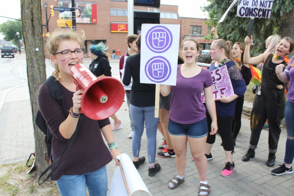 Jewel Sisson rallies her fellow Orillia Secondary School students Friday in front of the Orillia Opera House. The students walked out of school to protest the province's decision to repeal the modernized sex education curriculum. Nathan Taylor/OrilliaMatters