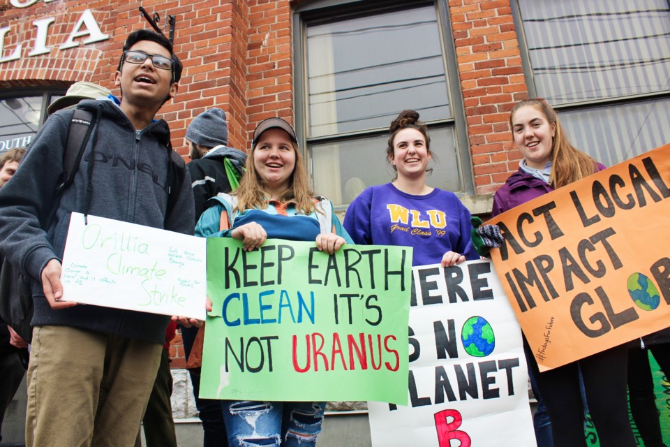 A climate strike demonstration was held Friday in front of the Orillia City Centre. Among those taking part were Fouz Ul-Mubeen, left, and Grace Long, second from left. Nathan Taylor/OrilliaMatters
