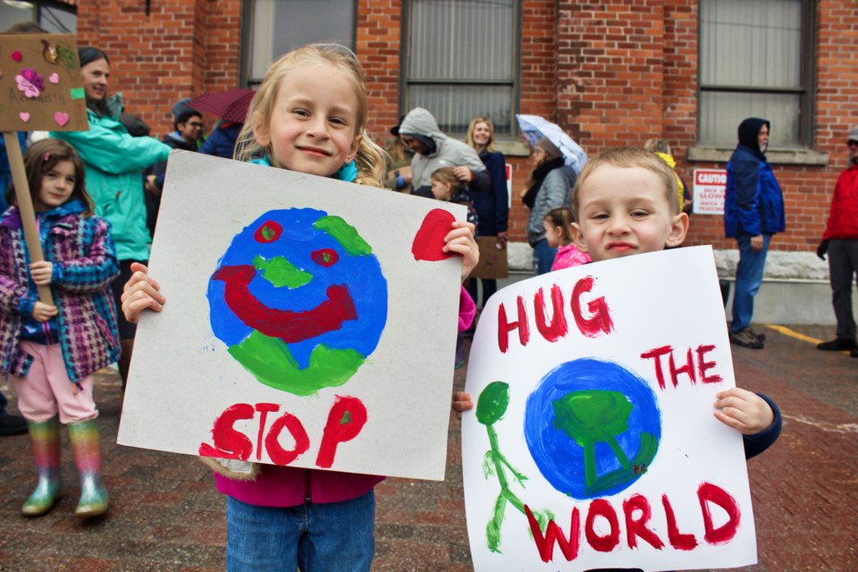 Siblings Evie, 5, and Scott Johnstone, 3, made signs and participated in a climate strike outside Orillia's City Hall in 2019. Nathan Taylor/OrilliaMatters File Photo