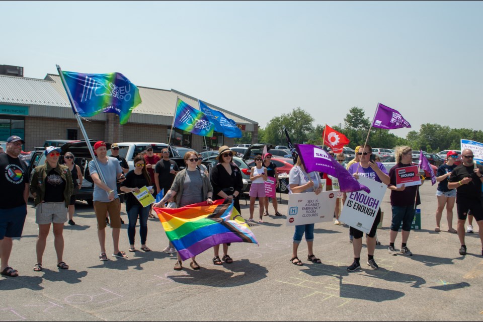 People frustrated with the provincial government gathered in front of Simcoe North MPP Jill Dunlop’s Orillia office Saturday for an Enough is Enough rally.