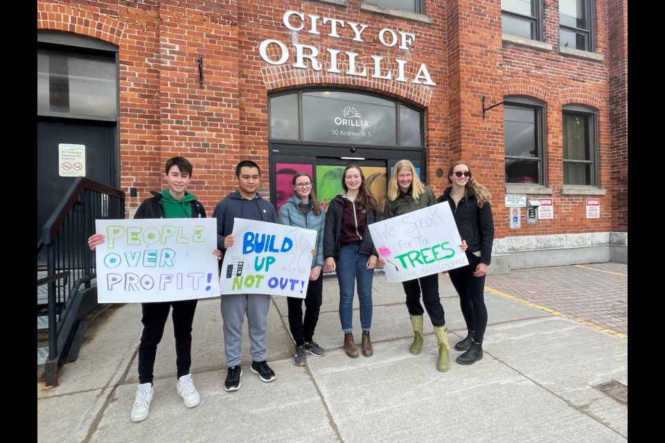 Members of the Sustainable Orillia Youth Council joined forces outside of the Orillia City Centre Friday to encourage the municipality to create a more ambitious climate change plan.
