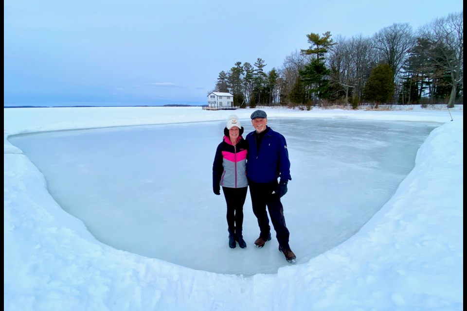 Helen and Reed Ellis are shown on the rink they created and maintain on Lake Couchiching at Brewery Bay.