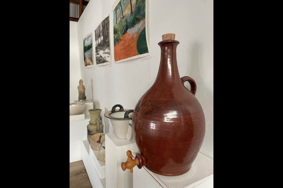 This is an example of how years of training, skill development and artistic talent can translate into a beautiful work of art such as this cider jug created by Roger Kerslake. 