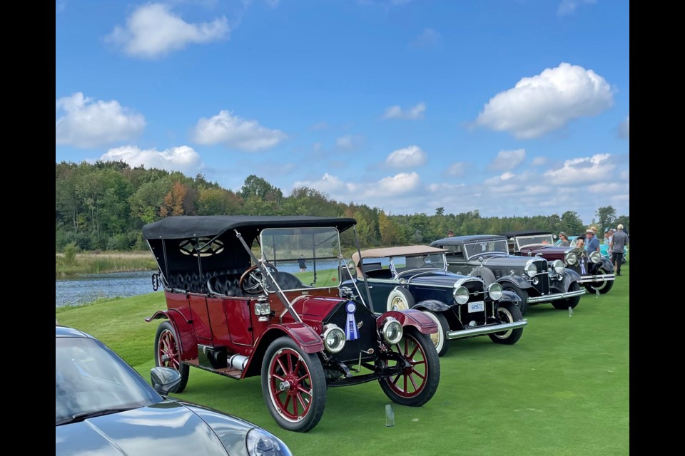 A highlight of the Cobble Beach Concours d’Elegance competition for Orillia Heritage Centre members John Smith and Bill McLean, was driving the 1912 Tudhope past the presentation centre to receive first prize. Following the presentation, the car became part of the prestigious winners’ circle. 