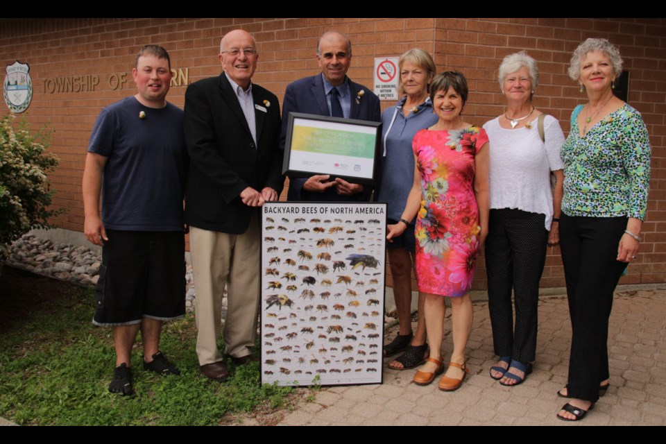 The recently formed Orillia Bee City group designated Severn Township as a bee city today. From left are Matt Thomson, steward of Orillia Bee City, John Betwsorth, councillor ward 3, Mike Burkett, mayor, Judith Cox, councillor ward 2, Shelly Candel, founder Bee City Canada, Nancee Adams and Jeannine Hutty, stewards of Orillia Bee City. Mehreen Shahid/OrilliaMatters