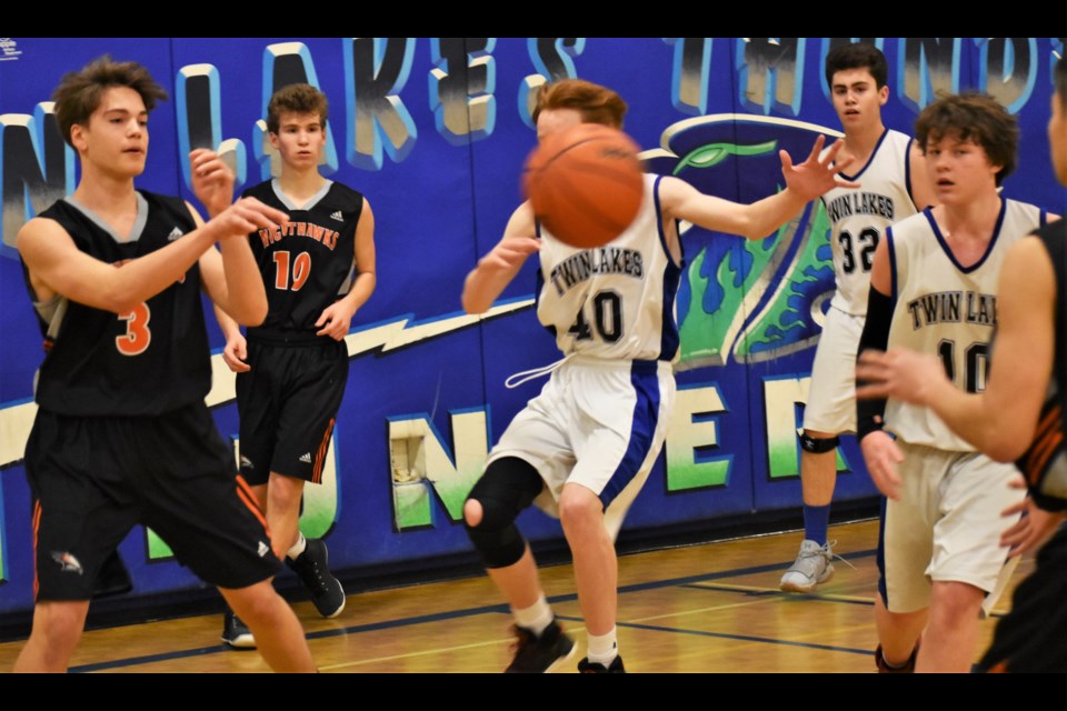 An OSS player tries to pass through traffic during junior boys' Blackball action Saturday morning. OSS beat Twin Lakes 62-37. Dave Dawson/OrilliaMatters