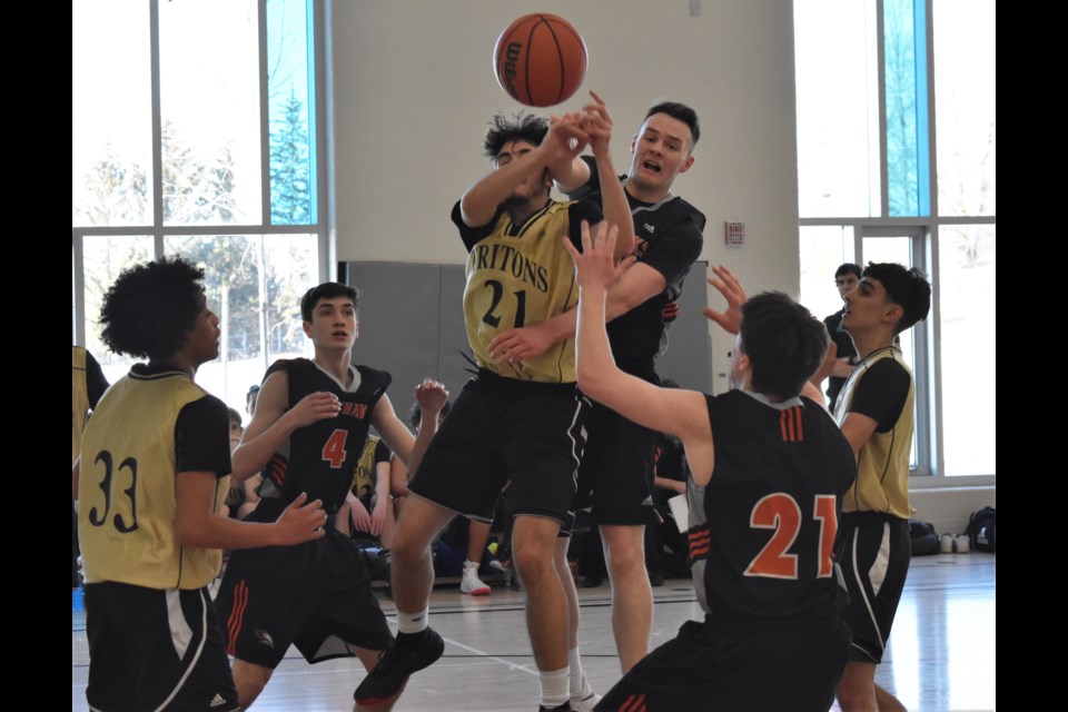 Orillia Secondary School's Hunter Murphy outmuscles a foe under the hoop during action Thursday. Murphy helped lead OSS to a dominant 69-32 triumph over Nantyr Shores. Dave Dawson/OrilliaMatters