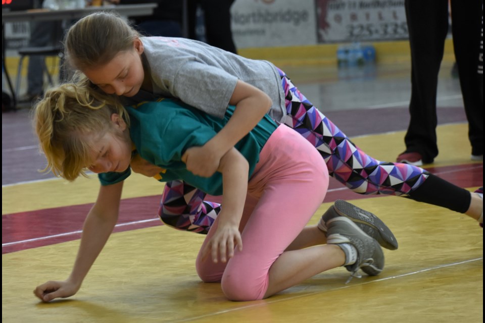 Sophie Nancekievill of Regent Park Public School gets the upper hand on a rival from another school during Tuesday’s City Elementary School Wrestling Championship at Rotary Place. Dave Dawson/OrilliaMatters