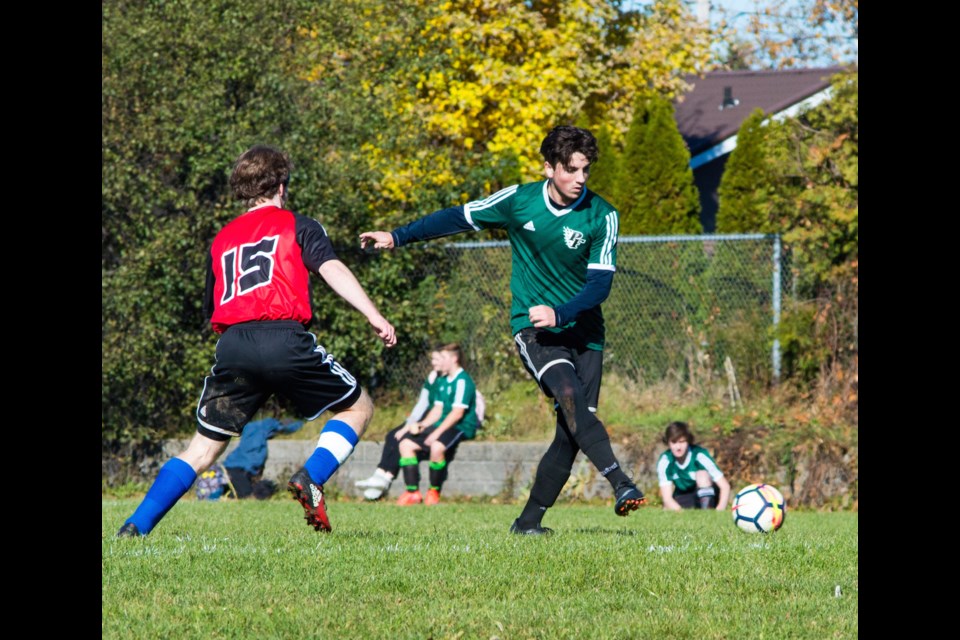 Kallum Holdsworth, right, led the Patrick Fogarty senior boys' soccer team to championship glory at the Georgian Bay championship last year. Tyler Evans/OrilliaMatters File Photo