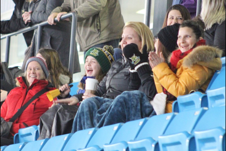 Parents and fans celebrate a goal Friday during a game between North Simcoe and Stoney Creek at Rotary Place, on the opening day of the 23rd annual Orillia Hawks girls hockey tournament. Nathan Taylor/OrilliaMatters