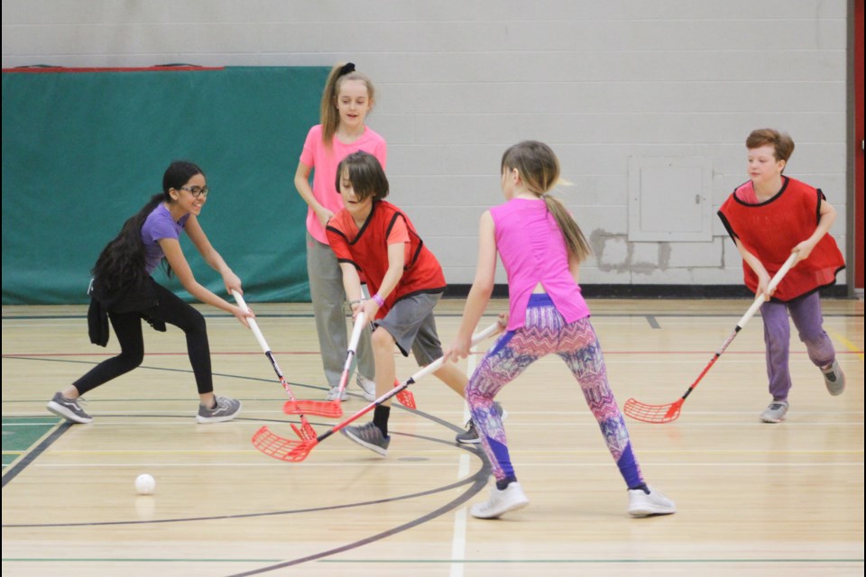 Students from Monsignor Lee Catholic School face off Friday during a game of floorball at Patrick Fogarty Catholic Secondary School. Nathan Taylor/OrilliaMatters
