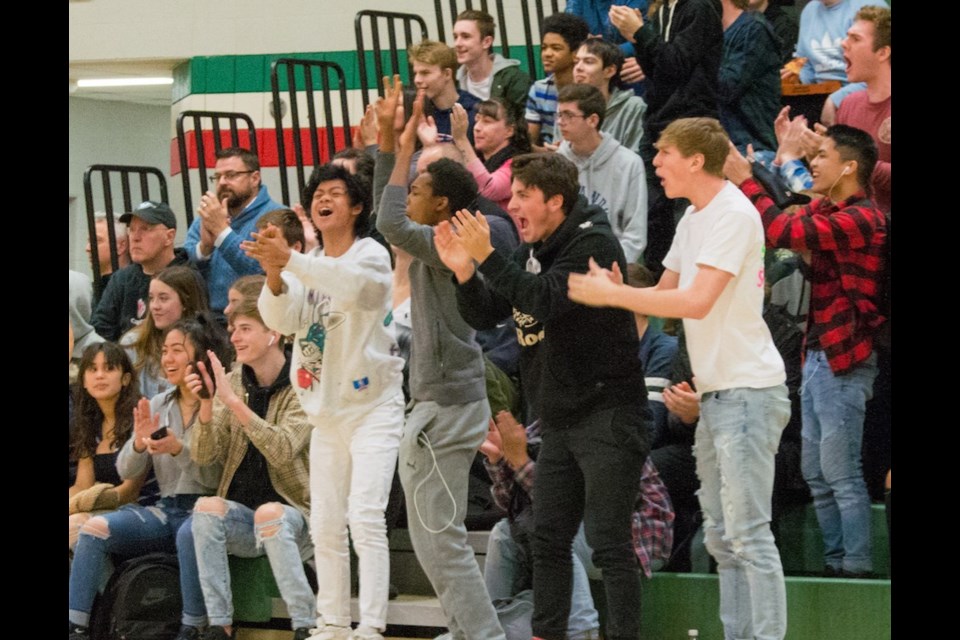 Patrick Fogarty students jump to their feet to cheer their junior boys to a 39-22 victory Friday afternoon. It's the first junior GBSSA title in seven years for the Orillia school. Tyler Evans/OrilliaMatters