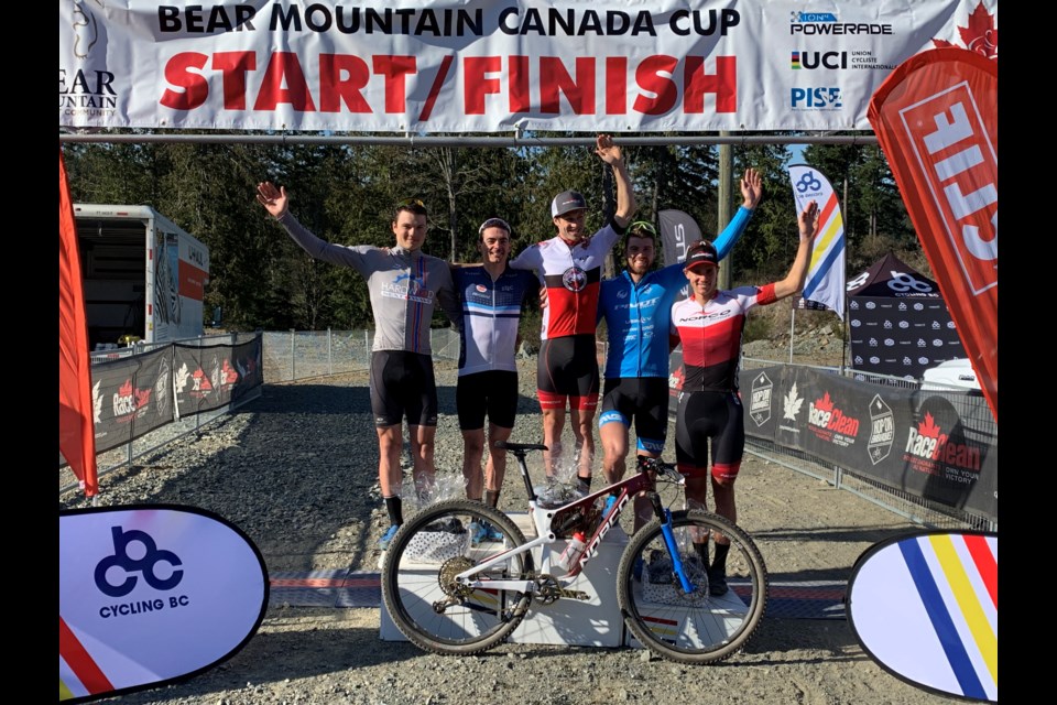 Gunnar Holmgren, far left, enjoys his moment on the podium after racing to an impressive fourth-place finish in the elite men's field at the Canada Cup in B.C. Contributed photo