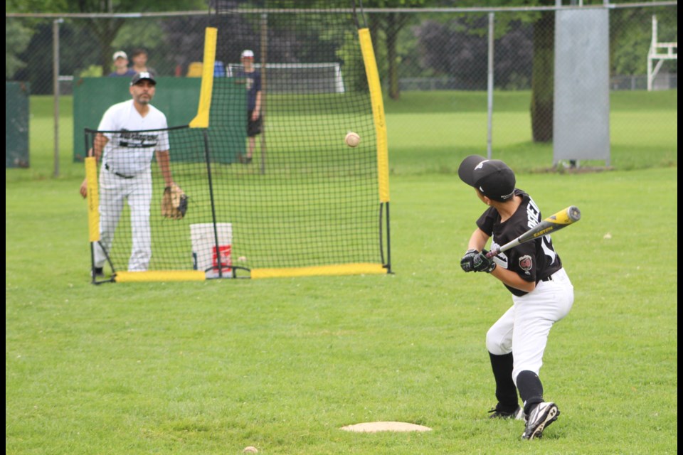 Joseph Pereira, of the Martingrove White Sox, prepares to swing Saturday during the home-run derby as part of Baseball Day in Orillia at Kitchener Park. Nathan Taylor/OrilliaMatters