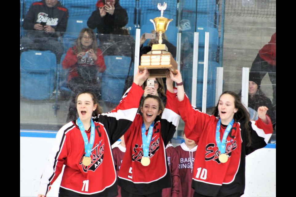 Members of the Eastern Region AAA ringette team hoist the trophy Sunday at Rotary Place after winning gold at the Orillia 2020 Ontario Winter Games. Nathan Taylor/OrilliaMatters