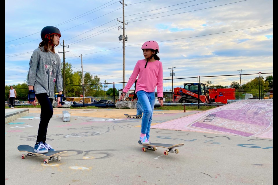 Megan Black, left, 10, and Lucy Goodman, 9, are shown Thursday at the Orillia skate park.