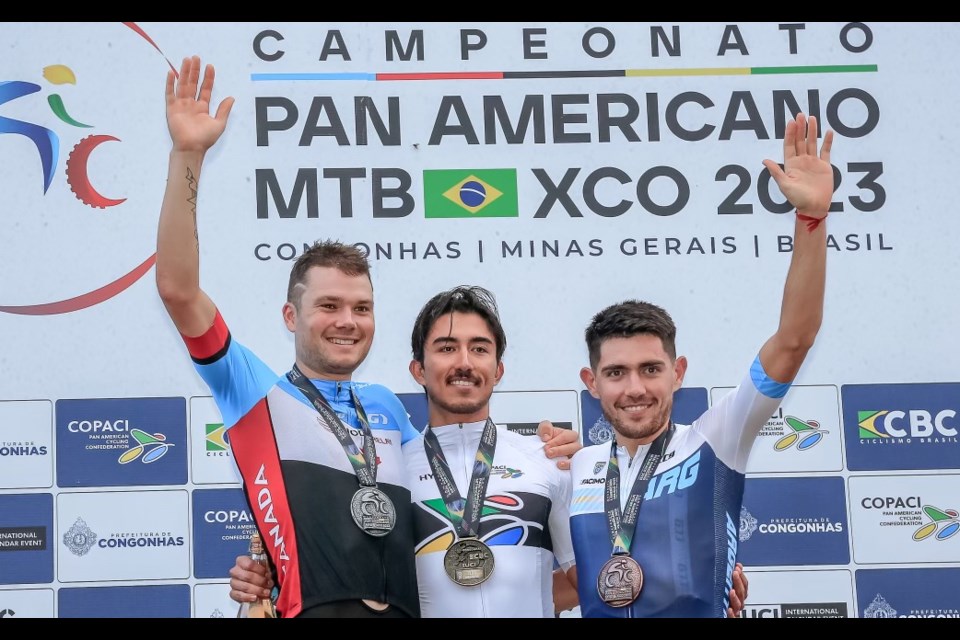 Gunnar Holmgren, left, an Orillia cyclist, won a silver medal at the Pan American Mountain Bike Championships in Brazil.