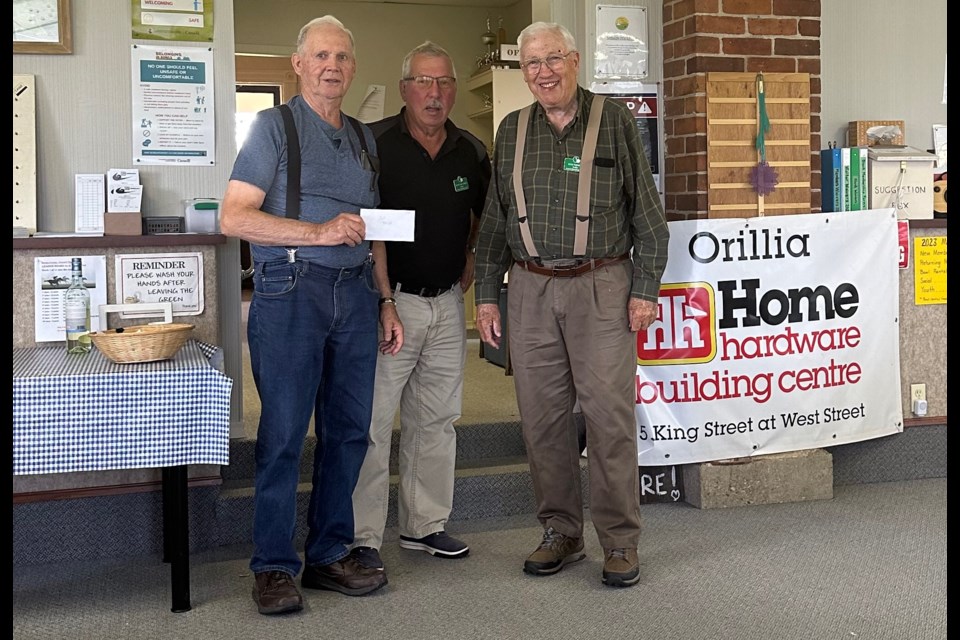 Placing first at a recent Orillia Lawn Bowling Club event were Harold Graham, Johnny Van Campen and Don Fleming.