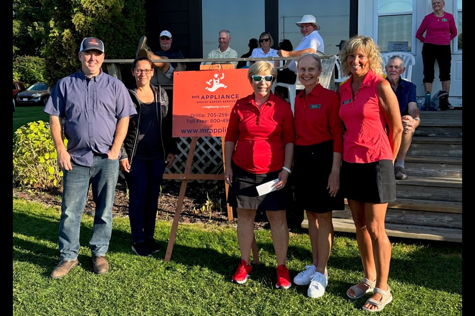Pictured with sponsors Jason and Ellena Francey are first-place finishers Betty Robitaille, Lori Mcleod and Fiona Diamanti, from Midland.