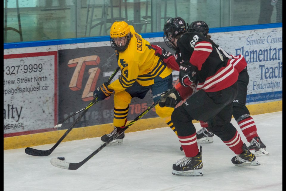 North Central Predators captain Devun Colebrook corrals the puck away from the Ajax-Pickering Raiders defence during the AAA Showcase in Orillia on Saturday.