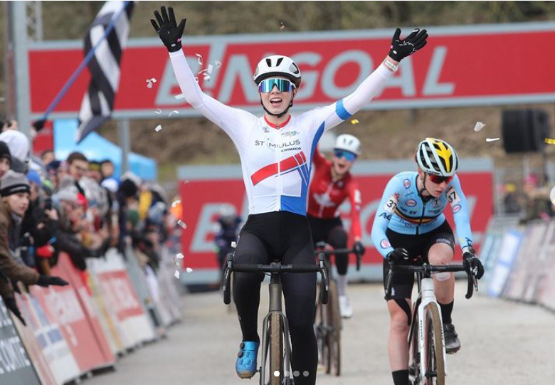 Ava Holmgren celebrates her first World Cup win in France Sunday. Just behind, in third place, is her twin sister, Isabella, who is shown cheering on her sister. It was the first time in history a Canadian athlete won a World Cup event in Europe.