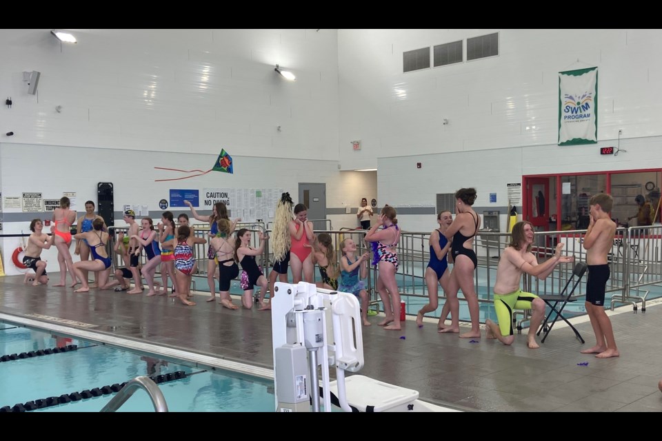 Swimmers perform in a lip sync contest during a fun meet in Collingwood.