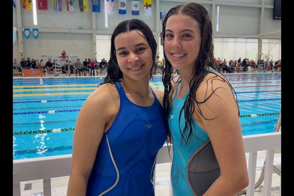 Orillia Channel Cats swimmers Taryn Fenton and Anna Holton are shown at the Ontario Youth Junior Championships in Markham.