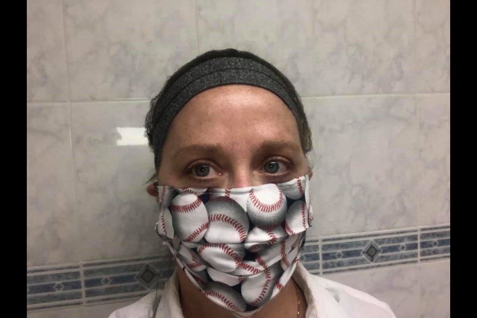 Christie Whetham has been displaying her slo-pitch spirit on her face mask while working the front lines of COVID-19. Contributed photo