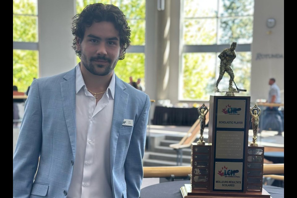 Colby Barlow is shown with the CHL's Scholastic Player of the Year Award. He earned the coveted honour at Saturday night's CHL awards gala in Kamloops, B.C.