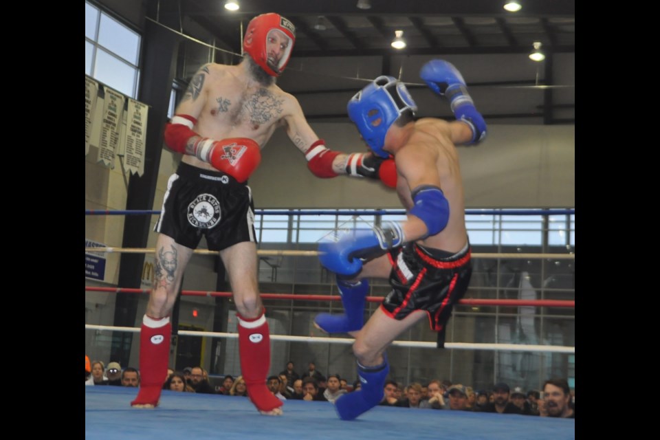 Nick Ryerse proved to be a hometown favourite in his match against Ottawa’s Gabe Alamo at the first Muay Thai Night held at Rotary Place. Ryerse is shown landing a solid left  that led to a knockdown and a unanimous decision in the 125-pound division tilt. Andrew Philips/OrilliaMatters