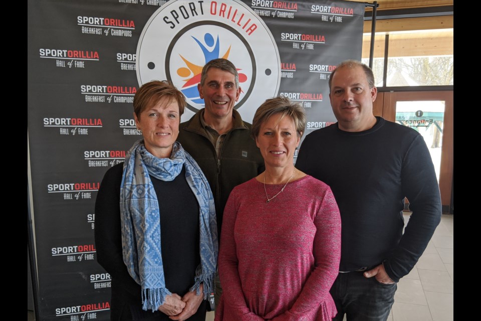 The newest inductees to the Orillia Sports Hall of Fame were unveiled at a media conference Wednesday. David Town, Bill Watters and Wayne Dowswell will be officially inducted April 18. In the photo, from left, are: Alison Dowswell, David Town, Lynn Dowswell and Brad Watters. Dave Dawson/OrilliaMatters