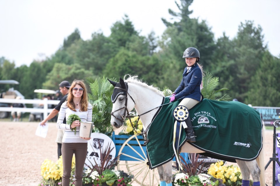 Hayden McCahon earned first place among 47 riders in the one-metre jumper class. Contributed photo