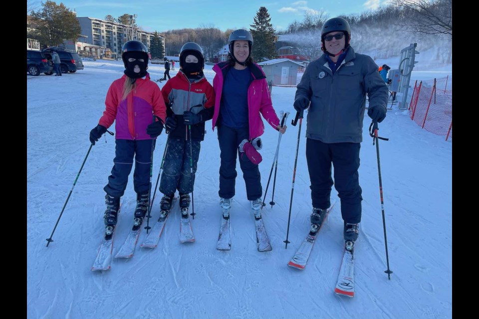 Members of the Venhuizen family are enjoying their first family ski trip this week despite the inconsistent winter weather. From left are Austin and Ally Venhuizen, Heather Furry and Steve Venhuizen.