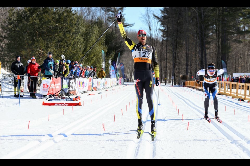 Team Hardwood's Lenny Valjas celebrates after capturing a gold medal at the Canadian National Cross Country Ski Championship in Quebec.  James MacLean photo