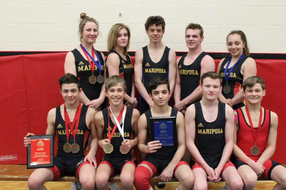 Local wrestlers shone on the national stage earlier this month. Front row, from left: Logan Smith, Cashius Aitken, Duncan Blake, Dom Ritchie and Jack Scott. Back row: Leigha Smith, Sam Cordery, Ian Stirling, Carson Bussieres and Zarah Yglesias. Contributed photo