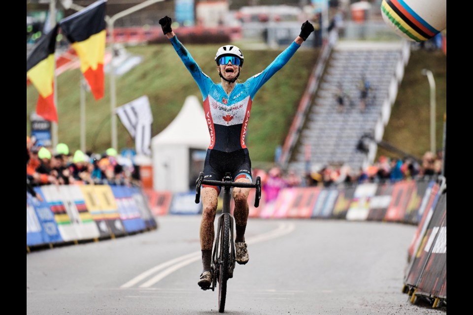 Isabelle Holmgren celebrates after crossing the finish line in first place at the 2023 World Cyclo-Cross Championship in the Netherlands Saturday. She was the first Canadian to ever win a medal at the world championship.