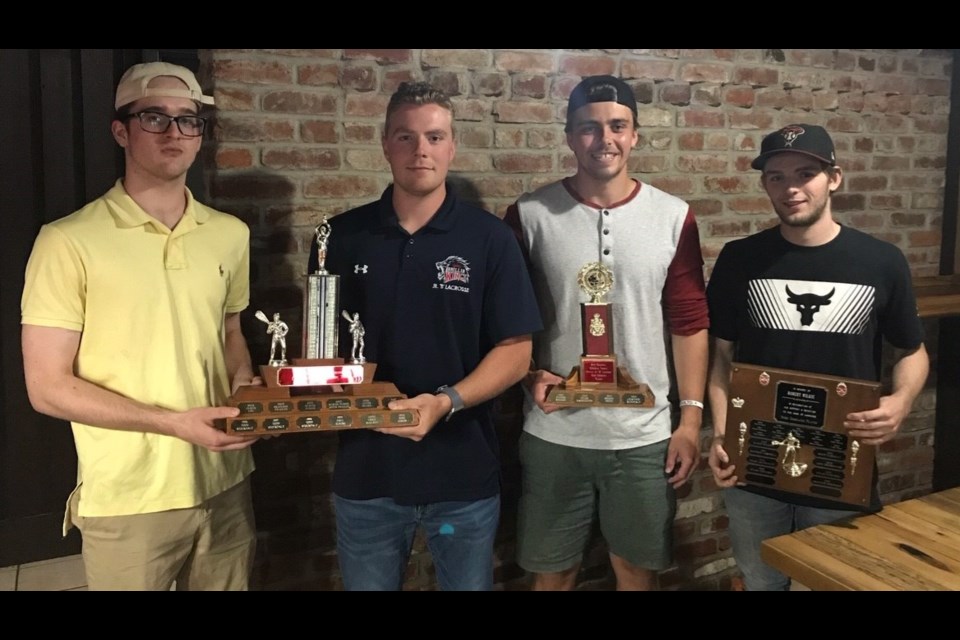 The team award members include, from left: Logan Matthews and Mitch Goode, co-winners of defensive player of the year, Cam Murphy (most improved player),  and Graydon McDonald (Mmost dedicated player).
