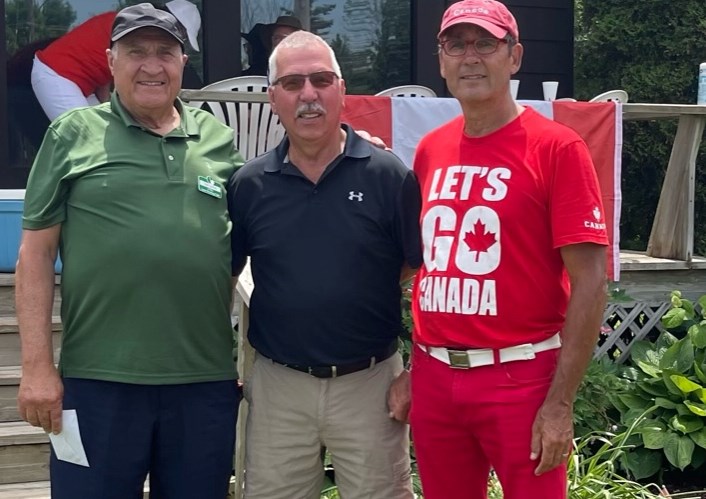 The Orillia Lawn Bowling Club hosted a fun tournament on Canada Day. Pictured, from left, are A Flight winners Tony Cupani, Johnny Van Campen  with drawmaster Robb Barsevich
