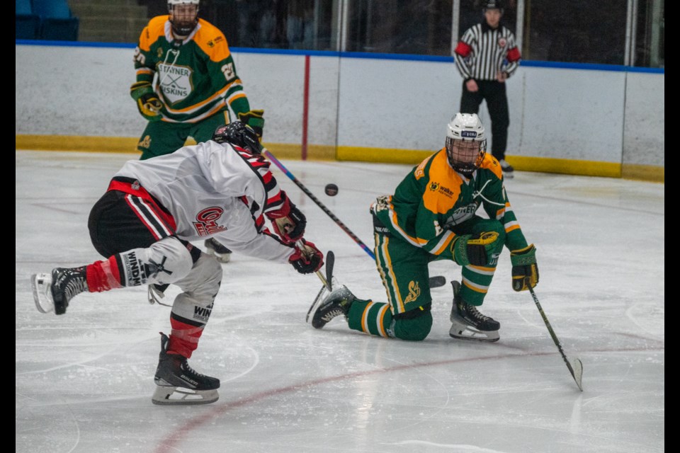 Stayner Siskins' defenceman William Muszynski blocks an Orillia Terriers' shot during Tuesday night's playoff contest at Rotary Place. Thanks to a 6-4 win, Stayner leads the series 3-0.